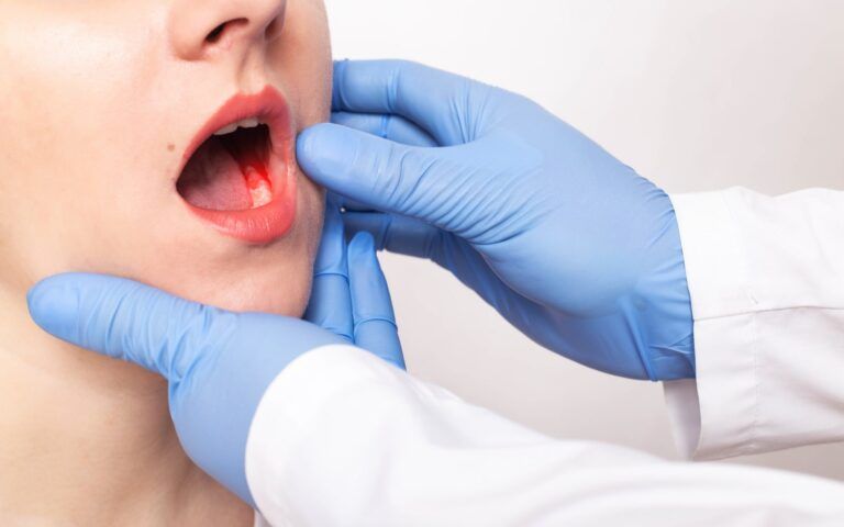 Dentist Analyzing Patient's Oral Health