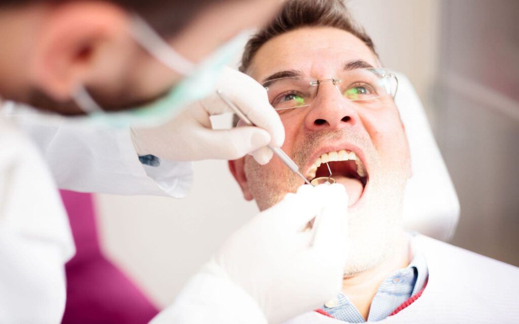 Man recieving dental care closeup